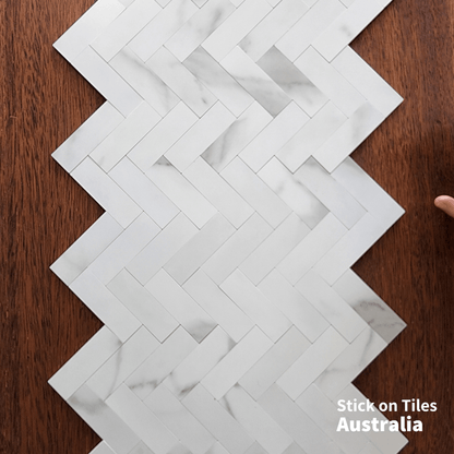 Herringbone Stick on Composite Tile - Carrara Marble - Stick on Tiles AustraliaStick on Tiles Australia